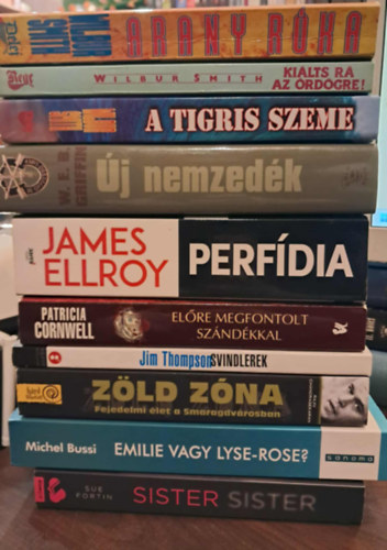 W. E. B. Griffin, James Ellroy, Patrica Cornwell, Jim Thompson, Rajiv Chandrasekaran, Michel Bussi, Sue Fortin Wilbur Smith - 10 db-os Krimi KÖNYVMENTŐ AJÁNLAT: Arany róka, Kiálts rá az örödögre!, A tigris szeme, Új nemzedék, Perfídia, Előre megfontolt szándékkal, Svindlerek, Zöld tóna, Emilie vagy Lyse-Rose?, Sister Sister