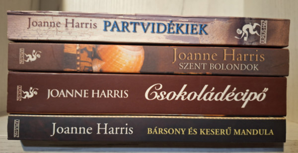 Joanne Harris - 4 k�tet: Partvid�kiek + Szent bolondok + Csokol�d�cip� + B�rsony �s keser� mandula