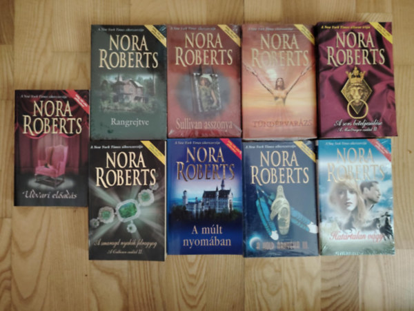 Nora Roberts - 9. db. Nora Roberts knv Hatrtalan vgy/ A hold rnyka III. / A mlt nyomban / Rangrejtve /  A sors beteljeslse / A smaragd nyakk felragyog / tndrvarzs / Sullivan asszonya / Udvari elads