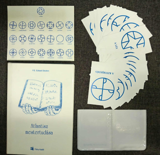 F. E. Eckard Strohm - Atlantisz mestertud�sa  (Fekete-feh�r fot�kkal illusztr�lva. A k�nyv mell�klete 1 �v matrica �s 22 db k�rtya m�anyag tokban.) teljes kiad�s